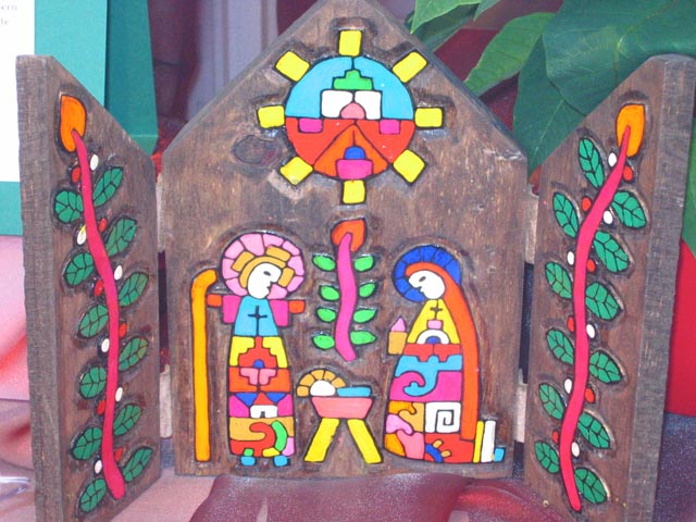 Nach Entwürfen von Fernando Llort gefertigt wurde diese Krippe aus El Salvador.